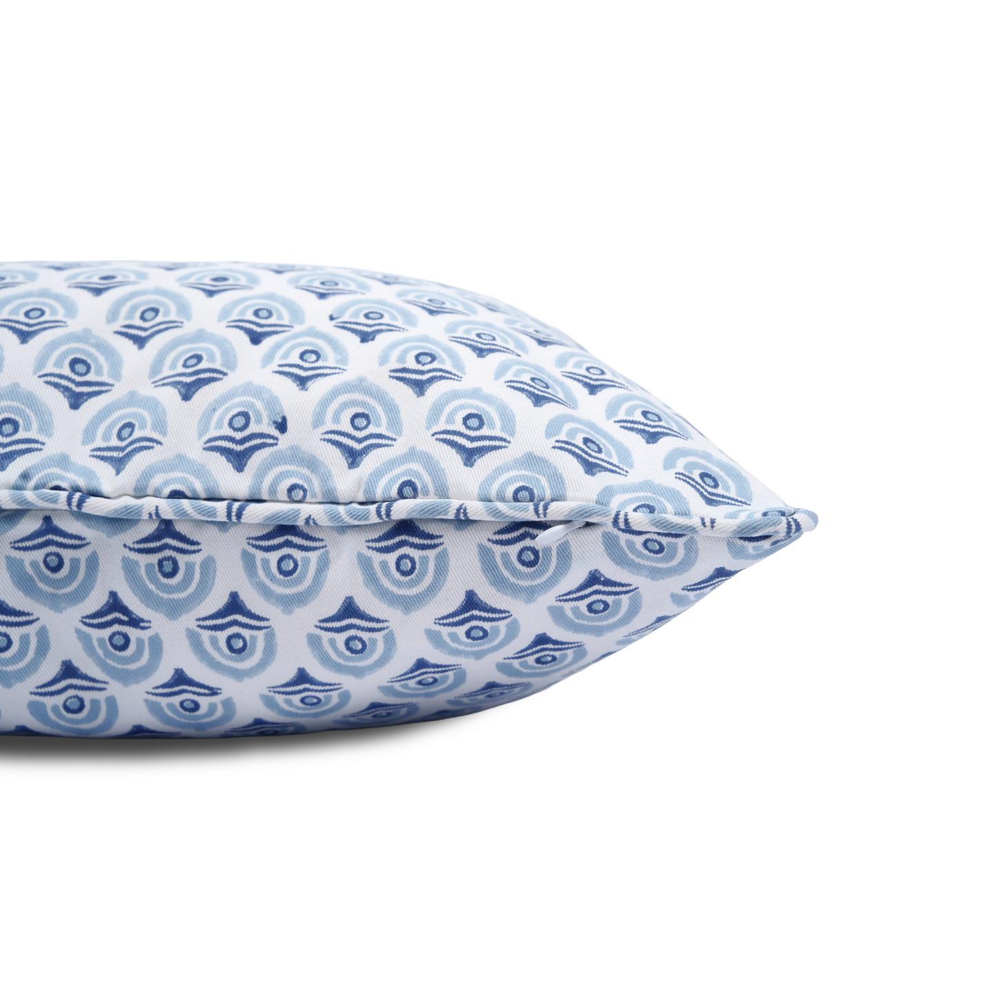 Close-up side view showing the hidden zipper closure and blue piped seam of the Arko Cerulean 100% cotton block printed pillow and cushion cover. Features a repeating scalloped arch pattern in cerulean blue and navy on white fabric, isolated on a white background.