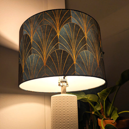 Decorative lamp with a patterned shade with warm light