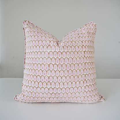 Square Bikaneri Topaz 100% cotton block printed pillow cover. This artisan throw cushion features a repeating hand-stamped scalloped arch pattern in soft pink and golden tan on a crisp white background. Beautiful handmade textile home decor.